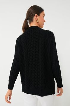 An incredibly cozy throw-on-and-go piece, the Black Cotton Abigail Cardigan is a true style staple. It's chunky without being too heavy, classic without being boring, and made in a timeless hue that will pair well with anything in your closet — plus, a slightly longer hem that hits at the top of the thigh and tonal tortoiseshell buttons act as special touches that take this silhouette over the top. We recommend wearing it anywhere and everywhere: in the office, on your next coffee date, running Classic Oversized Merino Wool Outerwear, Oversized Cable Knit Turtleneck Cardigan, Merino Wool Cardigan For Cold Fall Weather, Oversized Turtleneck Cable Knit Cardigan, Merino Wool Cardigan For Fall And Cold Weather, Oversized Cable Knit Turtleneck Outerwear, Classic Chunky Knit Sweater For Layering, Cozy Chunky Knit Outerwear For Work, Cozy Chunky Knit Turtleneck Outerwear