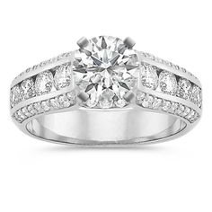 a white gold engagement ring with diamonds on it