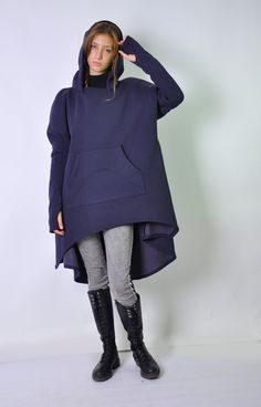 "Asymmetric Hoodie Dress, Sweatshirt Tunic, Thumb Hole Sleeves Top This long tunic is suitable for the winter season. It has a large hood and long sleeves. It is comfortable and very comfortable for your daily needs. The tunic has a large and warm hood and long sleeves that reach to the ends of the arms. Large pocket, soft and warm fabric. The tunic is very easy to wear and can be combined with many pants and leggings and it suits all body types. Model wearring size XS. material: fleece hooded c Navy Long Sleeve Hoodie With Pockets, Oversized Navy Sweatshirt For Fall, Navy Oversized Sweatshirt For Fall, Navy Long Sleeve Hoodie For Winter, Navy Long Sleeve Winter Hoodie, Navy Long Sleeve Hoodie For Fall, Winter Lagenlook Long Sleeve Hoodie, Lagenlook Long Sleeve Hoodie For Winter, Navy Hooded Hoodie For Winter