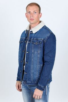 SIZE CHART Measurements: Model is wearing size Medium. A stylish and versatile denim jacket that is perfect for the colder months. The faux shearling lining keeps you warm and cozy, while the denim exterior is durable and stylish. This jacket features a long-sleeve design with a button placket and two buttoned pockets on the chest. It also has two hand pockets and cuffs with buttons. The jacket is made of denim and has a shearling-lined collar. The jacket is perfect for everyday wear and can be Sherpa Lined Denim Jacket, Mens Sherpa, Lined Denim Jacket, Dark Blue Color, Kids Outerwear, Blazers For Men, Sherpa Lined, Mens Outerwear, T-shirt Polos