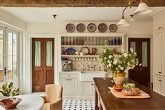 the kitchen is clean and ready to be used as a dining room or breakfast nook