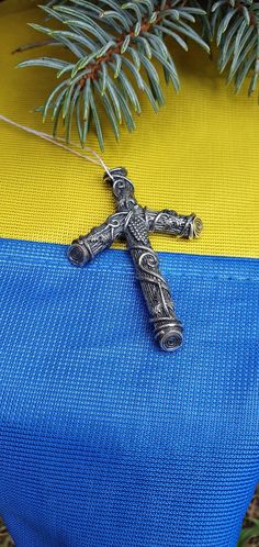 "* Product total height: pendant height 4.5 cm, width 3.0 cm; * Product weight: 13.8-14.6 grams ; * Metal: 925 sterling silver; This expertly crafted St. Nino's Cross Sterling Silver Pendant casts a spell of captivity on all who wear it! A bold piece for those who love mythical jewelry. Buy for yourself or gift it for that special person in your life! Grape, Georgian or Saint Nino solid silver cross adorned with a grape branch. The main symbol of the Georgian Orthodox Church and dates back to th Symbolic Engraved Cross Pendant Necklace, Symbolic Cross Pendant Necklace, Symbolic Crucifix Cross Necklace As Gift, Symbolic Cross Necklace Gift, Symbolic Cross Necklace As Gift, Handmade Spiritual Cross Pendant Necklace, Large Pendant Cross Necklace As Gift, Cross Necklace With Large Pendant As A Gift, Gift Cross Necklace With Large Pendant