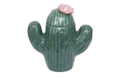 a green ceramic cactus with a pink flower on it's head, sitting in front of a white background