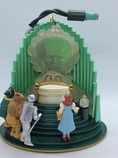 the wizard's castle is made out of plastic and has various figurines on it