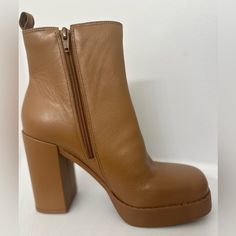 The Platform Boots From Gianni Bini Featuring Chelsea Style Side Gore Insets And A Chunky Block Heel. Size: 8.0 Color: Tan Cognac Heel 3.5” Platform 1” Side Zipper Closure Leather Rounded Closed Square Toe Brown High Heel Chunky Platform Boots, Beige Leather Chunky Platform Heels, Chic Boots With Lug Sole And Block Heel, Brown Leather Platform Boots With Chunky Platform, Leather High Heel Boots With Chunky Platform, Spring Leather Heeled Boots With Chunky Platform, Chic Heeled Boots With Lug Sole For Fall, Chic Fall Heeled Boots With Lug Sole, Chunky Platform Block Heel Boots In Faux Leather