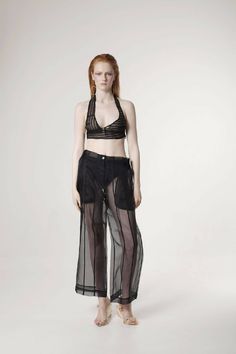 Tailored transparent wide leg black silk organza pants. Relaxed fit. Composition: 100% silk Care: Dry clean only Made in Latvia Sizes: S/M/L Models measurements: Height 173cm, Bust 82 cm, Waist 60 cm, Hips 88 cmModel wears size S Shipping: This garment is in stock and will be shipped within 5 - 8 working days from Latvia Black Silk Wide Leg Bottoms, Black Silk Wide-leg Pants, Elegant Black Sheer Bottoms, Sheer Black Bottoms, Elegant Mesh Bottoms For Evening, Chic Black Sheer Pants, Silk High-waisted Wide Leg Pants For Party, Sheer Black Full-length Bottoms, Evening Sheer High-waist Bottoms