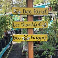 a wooden sign that says bee kind, bee thank and be happy