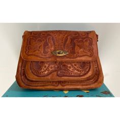 Vintage And It Shows! Originated In New Mexico. No Brand Markings Please Refer To Photos For Condition Vintage Brown Hand Tooled Satchel For Daily Use, Brown Leather-lined Clutch Shoulder Bag, Brown Leather Lined Clutch Shoulder Bag, Vintage Brown Hand-tooled Travel Shoulder Bag, Vintage Brown Hand Tooled Bag For Travel, Hand Tooled Vintage Brown Travel Shoulder Bag, Luxury Brown Hand-tooled Satchel, Luxury Hand Tooled Brown Satchel, Luxury Brown Hand Tooled Satchel