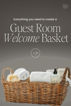 a wicker basket with towels and soaps in it that says guest room welcome basket