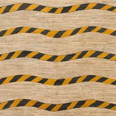 an area rug with yellow and black stripes on it, in the shape of wavy lines