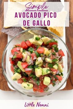 a glass bowl filled with guacamole and salsa