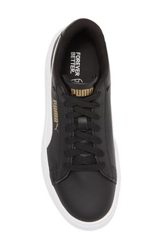 Give your wardrobe a boost with this sporty leather sneaker featuring comfortable cushioning and a platform sole. 1" platform Round toe Lace-up ties Padded collar Platform sole Leather upper/textile lining/rubber sole Imported Black Platform Sneakers With Embossed Logo And Round Toe, Black Platform Sneakers With Embossed Logo, Black Leather Platform Sneakers With Embossed Logo, Sporty Lace-up Platform Sneakers With Embossed Logo, Sporty Embossed Logo Lace-up Platform Sneakers, Sports Platform Sneakers With Embossed Logo, Sports Platform Sneakers With Embossed Logo And Round Toe, Synthetic Sneakers With Embossed Logo For Sports, Sports Sneakers With Embossed Logo In Synthetic Material