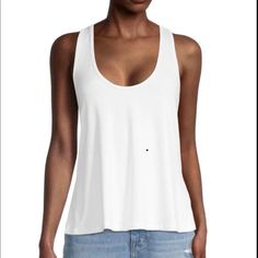 Sporty Tank Top In A-Line Silhouette Designed Solid-Hued For Versatile Styling In White. Scoopneck Sleeveless Pullover Style T-Back Polyester/Spandex Hand Wash Imported Size & Fit About 25" From Shoulder To Hem White Scoop Neck Tank Top With Built-in Bra, Casual Tank Top With Built-in Bra And Scoop Neck, Casual Scoop Back Tank Top For Spring, White Seamless Top With Scoop Back, White Seamless Scoop Back Top, White Seamless Tops With Scoop Back, White Stretch Scoop Neck Tank Top, Casual Scoop Back Tank Top For Summer, Casual Stretch Tank Top With Scoop Back