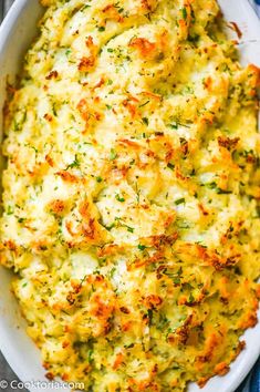 a casserole dish with broccoli and cheese