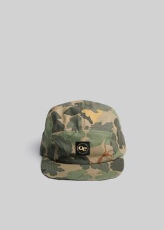 Named for those who create and approve.Originally from the 50s, we placed our custom P-53 pattern on 100% cotton ripstop and shaped it into a reinforced camp hat. The O.E. Full Circle logo tag reveals the center of it all. Camouflage 5-panel Hat For Streetwear, Military Style 5-panel Baseball Cap For Streetwear, Military Style 5-panel Streetwear Hat, Green Military 5-panel Hat, Wine Leaves, Camp Hat, Watch Cap, Clouds Pattern, Circle Logo