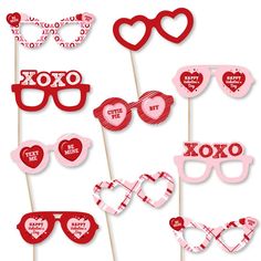 valentine's day photo booth props with heart shaped glasses and sunglasses on sticks for the party