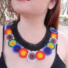 Mexican necklace, Huichol necklance, huchol choker, beaded choker. huichol art. This choker is a piece with a compound made by Huichol artisans, made entirely by hand, unique pieces, very colorful boho type, for any occasion. The Huichol artisans base all their works and their designs on visions they have during their sacred rituals proper to their ethnicity, The Huicholes inhabit the states of Nayarit, Jalisco, Zacatecas and Durango. Piece made by artisans nayaritas. Sent anywhere in the world from Tepic, Nayarit. Traditional Handmade Rainbow Necklace, Artisan Multicolor Boho Collar Necklace, Handmade Rainbow Beaded Choker Necklaces, Handmade Rainbow Choker Beaded Necklaces, Handmade Rainbow Beaded Choker Necklace, Handmade Rainbow Beaded Necklace For Festivals, Handmade Rainbow Choker For Festivals, Handmade Rainbow Choker For Festival, Multicolor Handwoven Festival Choker