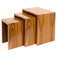 three pieces of wood sitting on top of each other