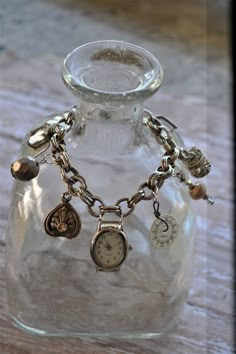 "Pieces of time... This listing features two very unique watch charm bracelets, created from a vintage assemblage of charms, timepieces and recycled jewelry parts. Wearing a separate watch isn't necessary, this is a watch and bracelet in one! As with all items in my shop, you can see this IS my obsession - repurposing broken and outdated jewelry into new creations. These most unusual and one-of-a-kind bracelets have unique charms and vintage beads, but most interesting is that the watch piece is Unique Jewelry Vintage Antiques, Adjustable Vintage Jubilee Charm Bracelet, Vintage Adjustable Charm Bracelet, Vintage Adjustable Charm Bracelet With Lobster Clasp, Adjustable Vintage Nickel-free Charm Bracelet, Watch Upcycle, Old Watches Crafts Ideas, Bracelets Watch, Recycled Watch