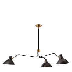 three light chandelier with black shades and gold accents on the bottom, in an industrial style