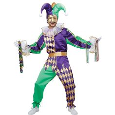 a man dressed in a clown costume holding a cane