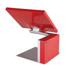 an electronic device with a red cover on it's display stand and silver base