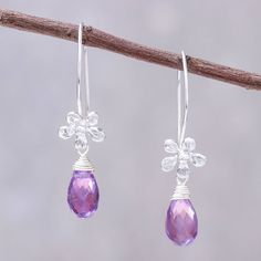 Featuring two teardrops of faceted amethyst that total 3.5 carats these earrings from Thailand's Khun Boom glitter with beauty. Each earring is crafted of sterling silver featuring a lovely daisy above each stone. Amethyst Color, Leather Chokers, Jewelry Packaging, Hook Earrings, Jewelry Gift Box, Free Jewelry, Handcrafted Jewelry, My Jewellery, Silver Earrings