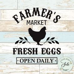 a sign that says farmer's market, fresh eggs open daily on wood planks