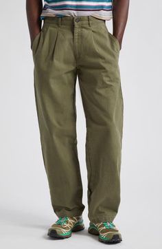 Japanese cotton in a herringbone weave adds to the premium comfort and lasting wear of these pleat-front pants that epitomize casual ease. 31 1/2" inseam; 17" leg opening; 11 1/2" front rise; 15 1/2" back rise (size 32) Zip fly with button closure Side-seam pockets; back button-welt pockets 100% cotton Machine wash, tumble dry Made in Portugal Designer Clothing Relaxed Fit Full-length Chinos With Belt Loops, Cotton Bottoms With Straight Hem For Casual Gatherings, Casual Cotton Bottoms With Straight Hem, Pleated Wide Leg Cotton Pants, Cotton Pleated Straight Pants, Pleated Cotton Straight Pants, Casual Cotton Bottoms With Pleated Waist, Casual Straight Leg Pants With Pleated Waist, Cotton Wide Leg Bottoms With Pleated Waist