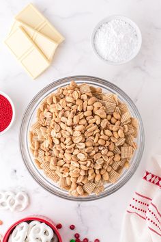 a bowl filled with cereal next to other ingredients