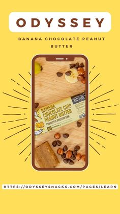 an advertisement for odyssey's chocolate peanut butter bar on a wooden cutting board