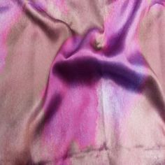 a pink and purple tie dyed fabric