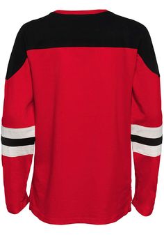 Let your little fan feel like one of the team in this Detroit Red Wings Youth Red Goaltender Crew Sweatshirt! They'll love showing off their pride in this Detroit Red Wings Crew Neck Shirt, which features a distressed softhand screenprint & overlay stripes. Distressed softhand screenprint on center chest, Overlay stripes, Self fabric necktape, Non functional skate lace at neck, Long sleeve, Contrast color detail on shoulders, Double stitched hemline and sleeve cuffs, Perfect for your young f Casual Red Tops With Ribbed Collar, Winter Streetwear Tops With Contrast Stripes, Casual Striped Cuffs Tops For Streetwear, Red Cotton Tops With Ribbed Collar, Red Cotton Top With Ribbed Collar, Sporty Red Top With Ribbed Cuffs, Red Ribbed Collar Tops For Streetwear, Cotton Crew Neck Tops With Striped Cuffs, Red Tops With Ribbed Collar For Streetwear