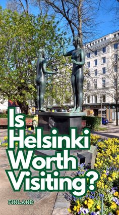 a statue with the words is helsinki worth visiting?