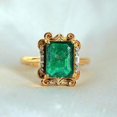 Emerald Ring Vintage, Real Emerald Ring & Diamond For Women, 14k Emerald Solitaire Wedding Ring, 3Ct Octagon Emerald Cut Stacking Ring Gift This ring features a stunning 3 Carat Natural Dark Emerald from Zambia framed by two baguette diamond moissanite and round diamond moissanite. This ring looks more beautiful in real with all vintage vibe. Available in 14K solid yellow gold & 18k Gold plated over silver. This ring acts as a perfect birthstone stacking ring, or a beautiful  & unique gift for w Timeless Emerald Cut Ring For Wedding, Fine Jewelry Emerald Cut Ring For Proposal, Emerald Cut Fine Jewelry Ring For Proposal, Luxury Diamond Ring With Emerald Accent Stones, Luxury Octagon Emerald Ring With Prong Setting, Asscher Cut Emerald Ring For Wedding, Formal Octagon Emerald Diamond Ring, Asscher Cut Emerald Wedding Ring, Asscher Cut Yellow Gold Gemstone Wedding Ring