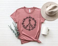 "Peace Shirt, Peace T-shirt, Peace Sign Shirt, Peace Sign T-Shirt, Peace Symbol, Peace T-Shirt, Peace Symbol Shirt, Graphic Tees For Women ⭐Please Check All Photos For Details. 🐞Choose Your T-Shirt Size From The Drop-Down Lists Next To The item Picture ⭐Choose Of Your T-Shirt Color From The 2nd Picture 🐞Use \"Add message to Seller\" link On The Checkout Page To Send me the Following important Details For Your Order's Customization. ⭐Shipping Time Varies by location (we are located in Sugar Lan Peace And Love Hippie, Flower Peace Sign, Peace Sign Shirt, Peace Flower, Peace Sign Shirts, Graphic Tees For Women, Hippie Flowers, Tees For Women, Peace Sign