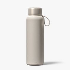 thermos bottle is shown with a white lid and nozzles on it