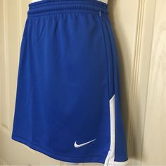 Nike Lacrosse Skirt. Elasticized Waist And Pull Cord. Length 15” Inches. Measurements Laying Flat : Waist 17” Inches, Hip 22” Inches. Sporty Short Blue Skirt, Nike Blue Skort For Spring, Blue Casual Sports Skirt, Casual Blue Sports Skirt, Red Tennis Skirt, Nike Skort, Nike Skirt, Nike Tennis Skirt, Nike Skirts