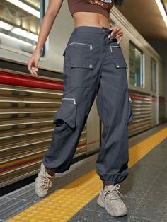 Experience rugged style and practicality with our Street Flap Pocket Cargo Pants. Designed for casual wear, these plain-patterned pants feature a zipper fly and a natural waistline for a comfortable fit. With a regular fit and long length, they offer freedom of movement while maintaining a trendy look. The non-stretch fabric ensures durability, making them perfect for any adventure. Details: Style: Casual Pattern Type: Plain Type: Cargo Pants Closure Type: Zipper Fly Waist Line: Natural Length: Casual High Waist Bottoms With Zip Fly, Utility Pants With Zipper Closure For Fall, Urban Cargo Trousers For Outdoor, Urban Cargo Jeans For Outdoor, Outdoor Tapered Leg Pants With Cargo Pockets, Straight Cargo Style Bottoms For Outdoor, Straight Cargo Pants For Outdoor, Straight Cargo Style Pants For Outdoor, Utility Trousers For Outdoor