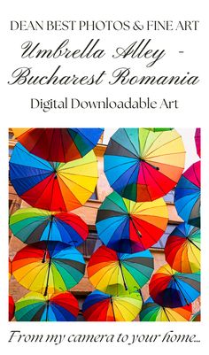 many colorful umbrellas are hanging from the side of a building with text that reads, dear best photos fine art unhelella alley - bucher's romania digital