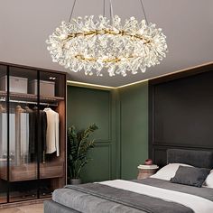 a bedroom with a bed, closet and chandelier hanging from it's ceiling