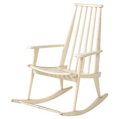 a white wooden rocking chair on a white background with clippings to the bottom