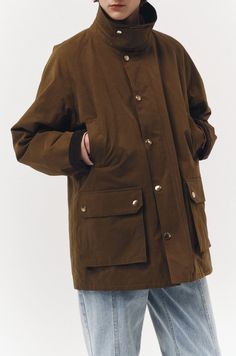 Dunst unisex khaki waxed cotton hunting jacket. UDTR3C10 2K2 PIPE AND ROW Fall Hunting Outerwear With Fleece Lining, Waterproof Hunting Outerwear For Fall, Waterproof Hunting Outerwear For Winter, Winter Brown Utility Jacket For Outdoor, Winter Khaki Sport Coat With Patch Pockets, Utility Style Khaki Sport Coat For Winter, Brown Sport Coat For Outdoor Activities In Fall, Casual Winter Hunting Sport Coat, Khaki Utility Jacket For Hunting In Fall