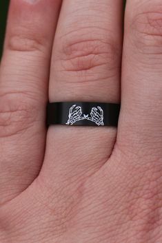 This elegant double skeleton pinky promise ring is built to last, crafted from resilient black stainless steel. Perfect for couples or best friends seeking a meaningful sign of their connection, this ring is sure to become a treasured reminder of their bond. Durable and damage-resistant, this symbolic piece is crafted from strong black stainless steel--a token that will stand the test of time. Product Details: Materials: Black Stainless Steel Color: Black Size: 6mm You will receive one hand-stam Black Metal Skull Ring As Gift, Black Metal Skull Ring Gift, Black Metal Skull Ring For Gift, Gothic Stainless Steel Promise Ring, Black Stainless Steel Skull Ring As Gift, Black Stainless Steel Skull Ring For Gift, Gothic Black Promise Rings, Black Gothic Stainless Steel Skull Ring, Black Stainless Steel Promise Jewelry