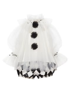 a white dress with black and white polka dots