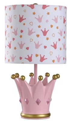 a pink and gold lamp with a crown on it