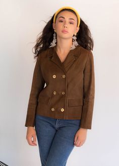 "Vintage 60s Mod suede jacket. Subtle suede double-breasted jacket in a chocolate brown. Notched lapel. Long sleeves. Front flap pockets. Boxy silhouette. Decorative Mod square front button fastening. Fully lined. We kindly ask that you please view all measurements for comparison so you can get your desired fit. Made in Spain. * Brand: Maema, Madrid * Decade: 1960s * Fabric: Suede * Lining: Acetate * Color: Chocolate Brown C O N D I T I O N Excellent vintage condition, minimal pre-wear; no major Brown Double-breasted Blazer With Lapel Collar, Brown Double-breasted Blazer With Buttons, Brown Leather Jacket With Double Button For Work, Brown Suede Leather Jacket For Work, Brown Leather Jacket For Work, Brown Double-breasted Blazer For Fall, Vintage Brown Double-breasted Pea Coat, Brown Suede Blazer For Work, Brown Double-breasted Leather Jacket For Work