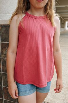 Get ready to rock this Girls Dark Blush Ribbed Tank! The soft, ribbed fabric feels like a dream against your skin, while the dark blush color adds a touch of subtle femininity. Perfect for layering or wearing on its own, this tank is a must-have for any girl's wardrobe. (Trust us, you won't be able to resist!) Spring Solid Ribbed Tank Top, Pink Ribbed Tank Top For Spring, Pink Racerback Top For Spring, Pink Ribbed Racerback Top, Pink Ribbed Tank Top For Summer, Pink Ribbed Stretch Tank Top, Stretch Ribbed Pink Tank Top, Pink Ribbed Tank Top, Dark Blush