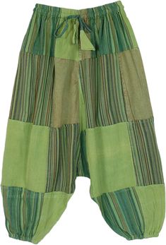 A cool green, striped and solid patchwork harem style pants for the young with elastic bottom.  The complimenting patchworks add to the versatility and style of this wardrobe essential. #tlb #Patchwork #Yoga #vacationclothing #beachwrap #Striped #bohemianfashion #Handmade #HippiePants #PatchworkPants #KidsPants Green Patchwork Pants For Spring, Green Cotton Patchwork Pants, Green Baggy Patchwork Pants, Baggy Green Patchwork Pants, Green Patchwork Bottoms For Summer, Bohemian Green Patchwork Bottoms, Bohemian Green Bottoms With Patchwork, Summer Green Patchwork Bottoms, Green Cotton Harem Pants