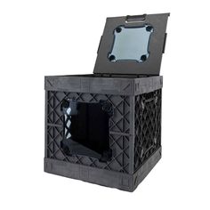 an open black box with a mirror in it